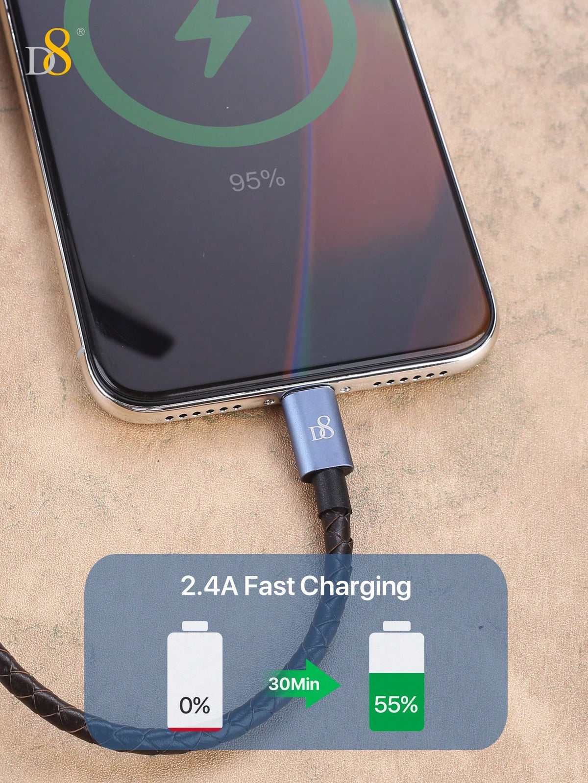 Smartphone with charging cable displaying fast charging feature on a beige background